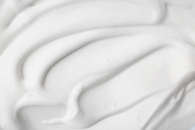 Photo of Delicious natural yogurt as background, top view