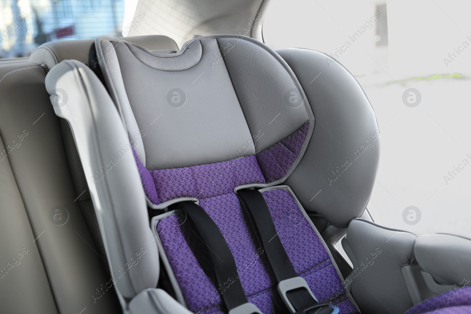 Photo of Empty modern child safety seat inside car