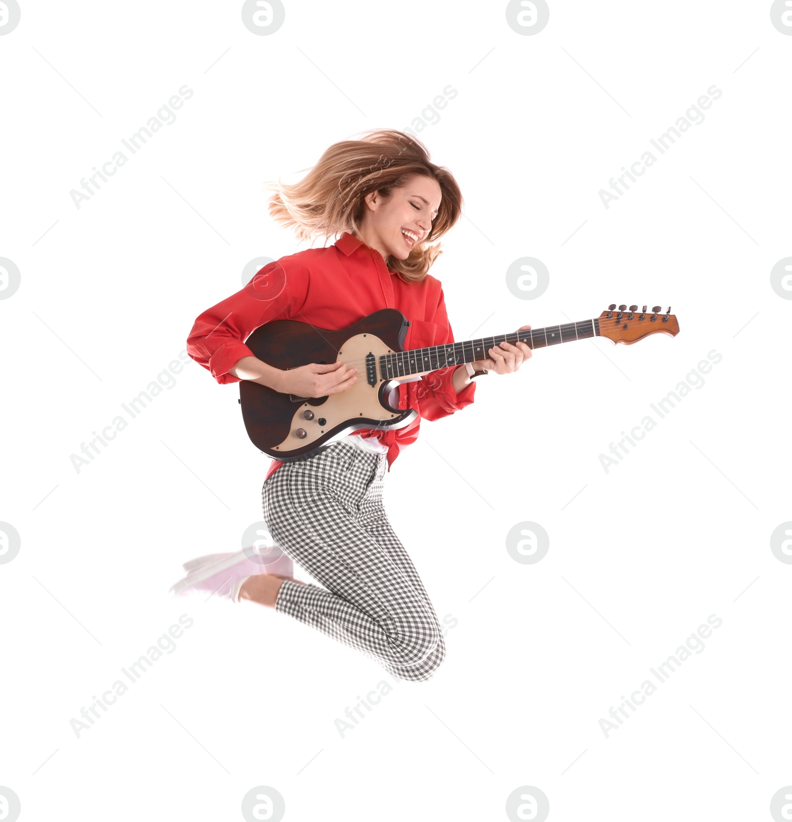 Photo of Young woman playing electric guitar on white background