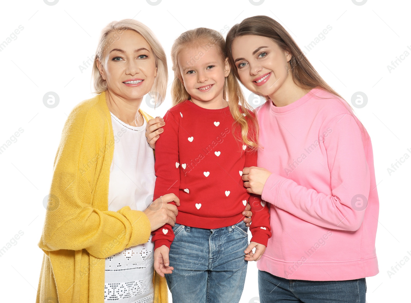 Photo of Portrait of young woman, her daughter and mature mother isolated on white