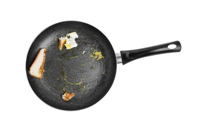 Dirty non-stick frying pan on white background, top view