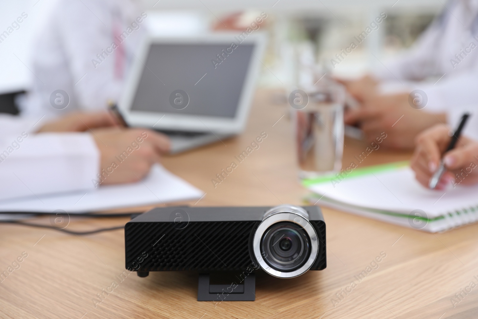 Photo of Video projector on table during medical conference