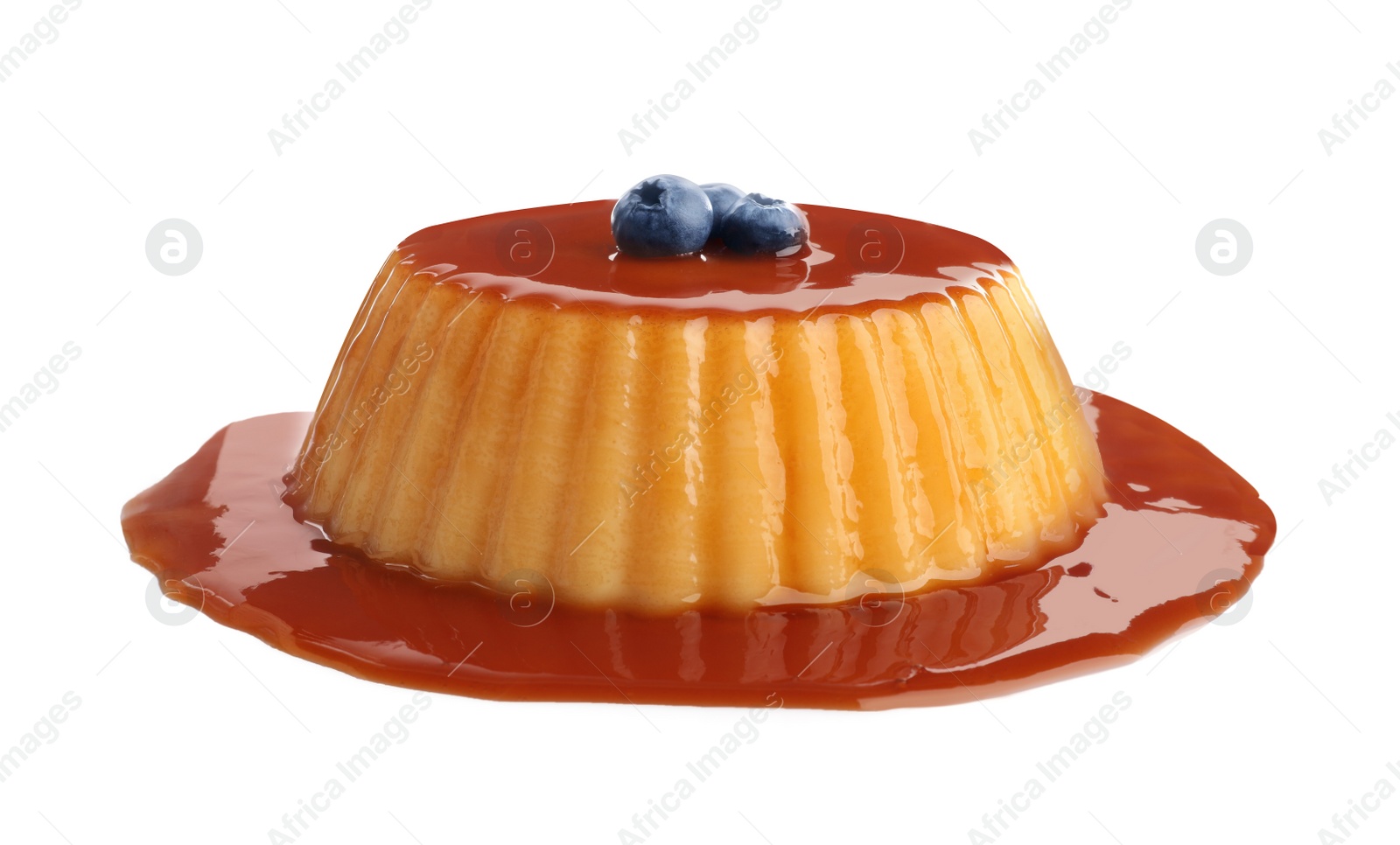 Photo of Delicious pudding with caramel and blueberries isolated on white