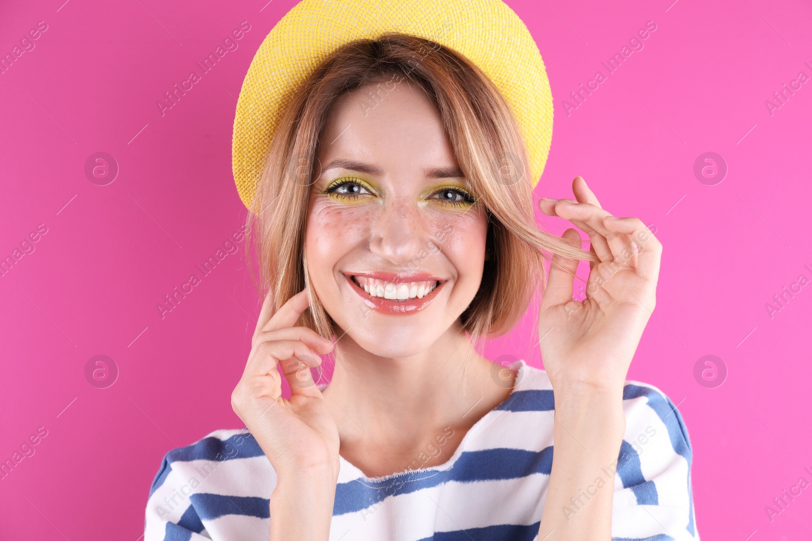 Photo of Beautiful young woman posing on color background. Summer fashion