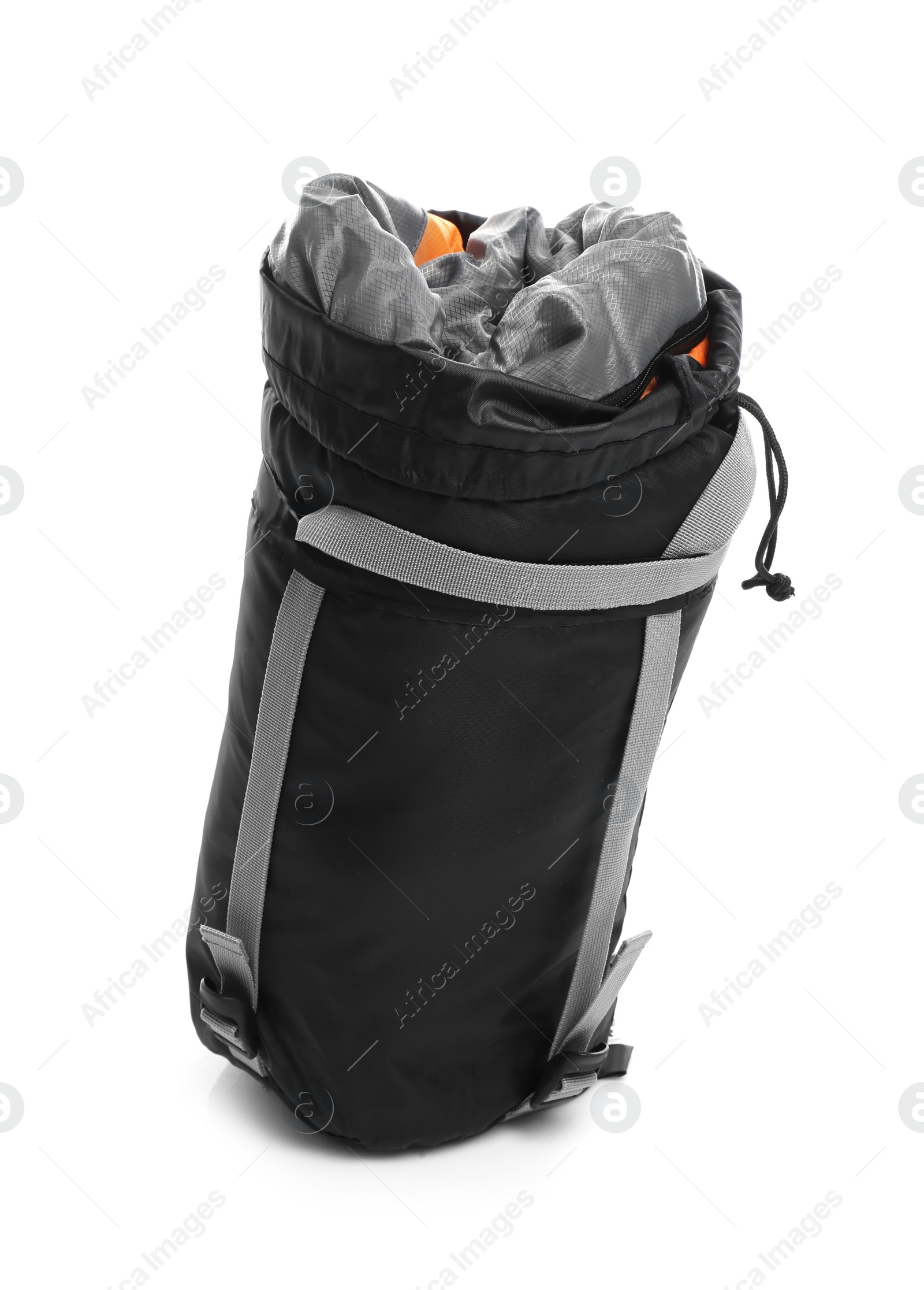 Photo of Sleeping bag in case on white background. Camping equipment