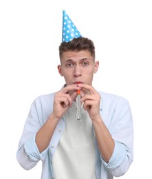 Photo of Young man in party hat with blower on white background