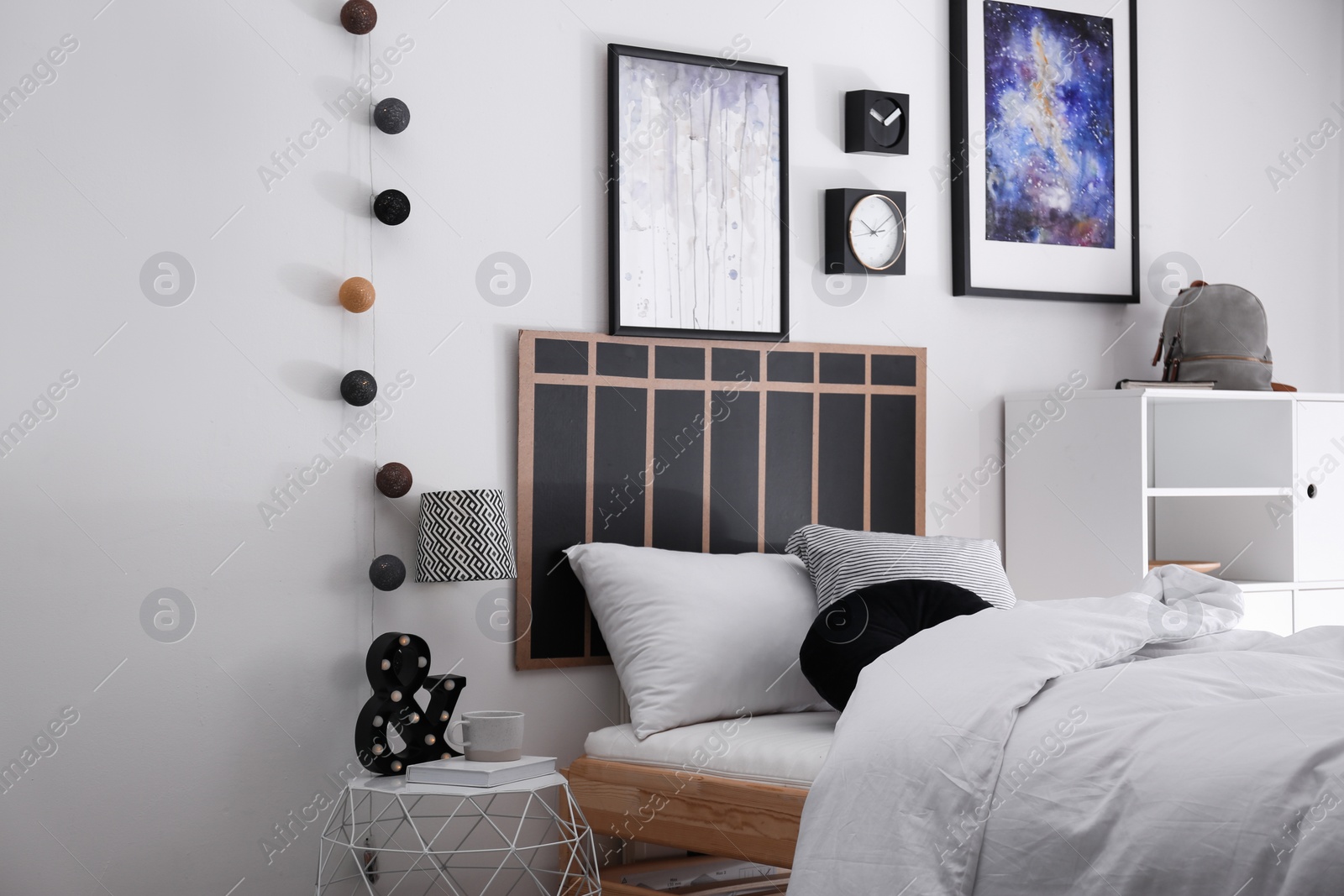 Photo of Modern teenager room interior with comfortable bed