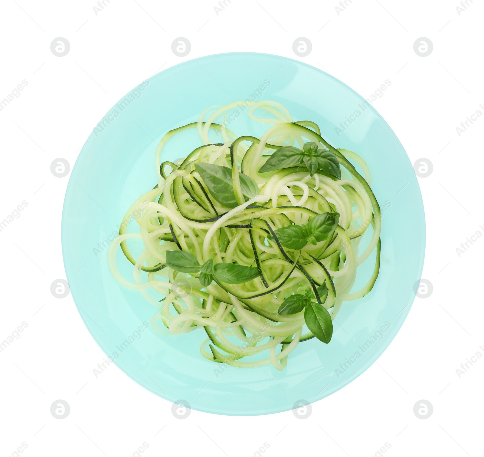 Photo of Tasty zucchini pasta with basil isolated on white, top view