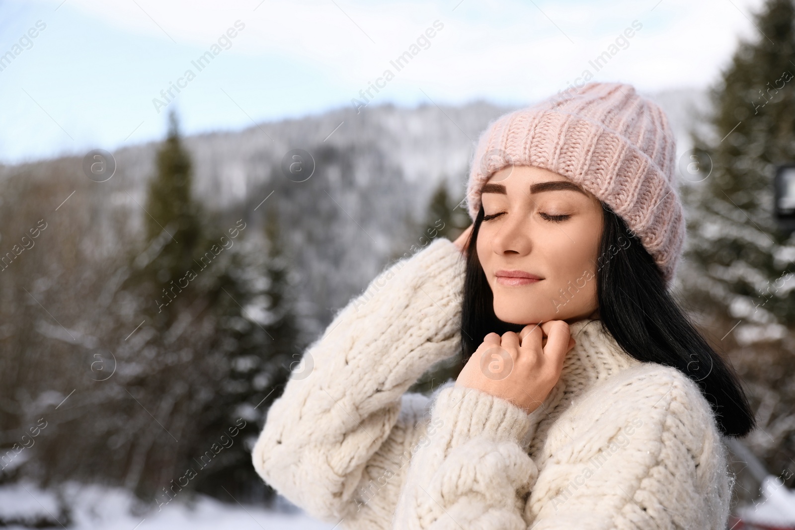 Photo of Portrait of beautiful young woman on winter day