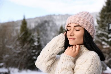 Portrait of beautiful young woman on winter day