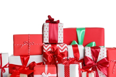 Photo of Beautifully wrapped gift boxes on white background