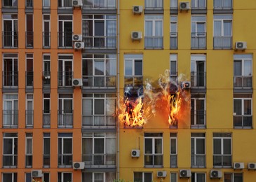 Image of Modern buildings engulfed in flames. Fire safety violations