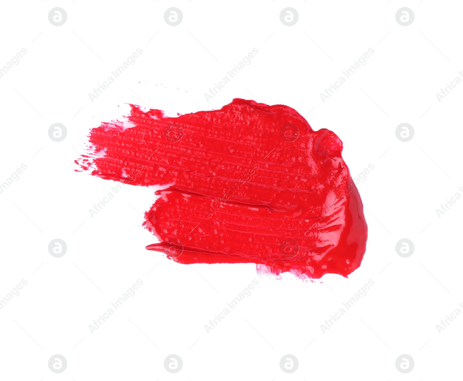 Photo of Stroke of red lip gloss isolated on white, top view