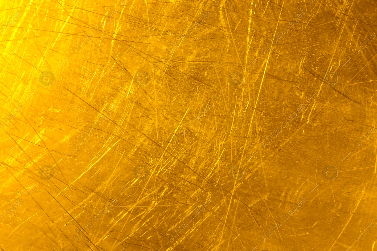 Image of Texture of scratched golden surface as background, closeup