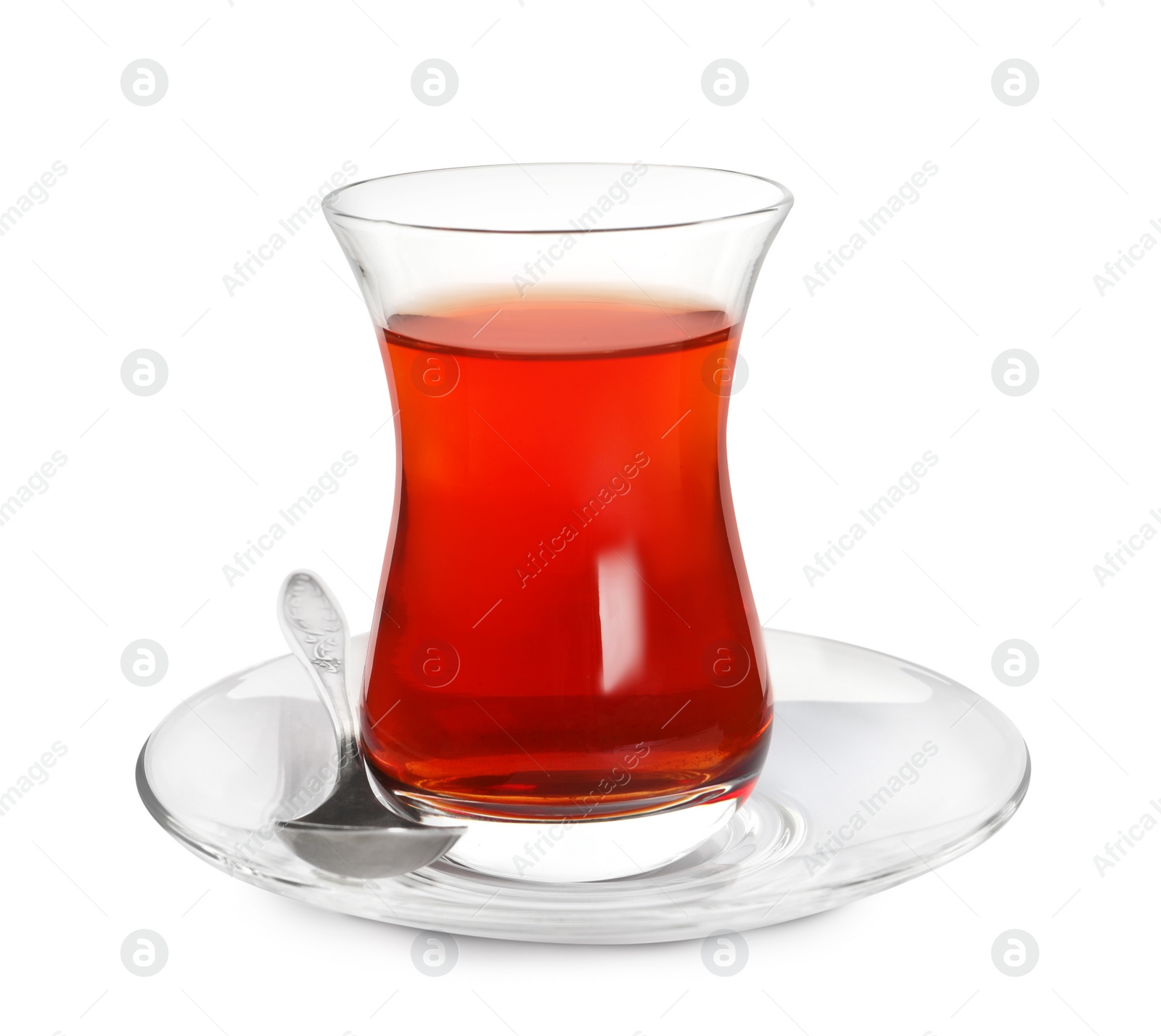 Photo of Glass of traditional Turkish tea with spoon isolated on white