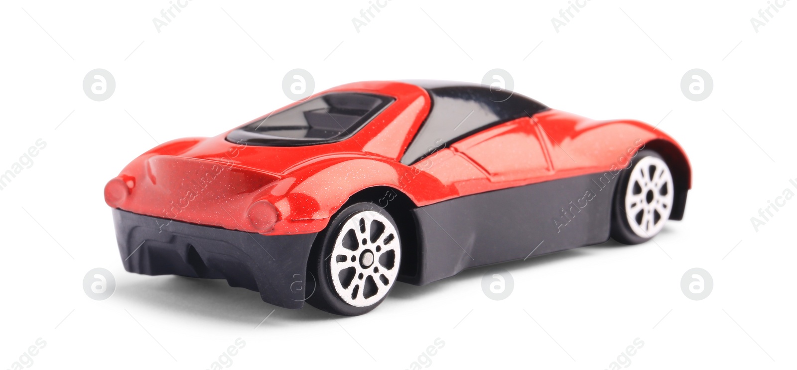 Photo of One red car isolated on white. Children`s toy