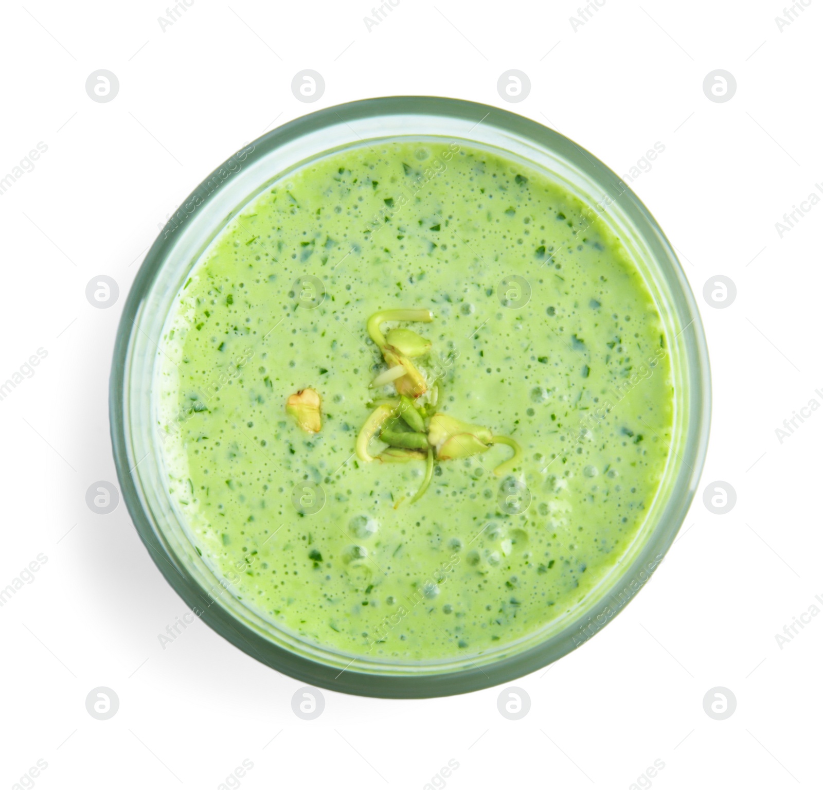 Photo of Glass of green buckwheat smoothie isolated on white, top view