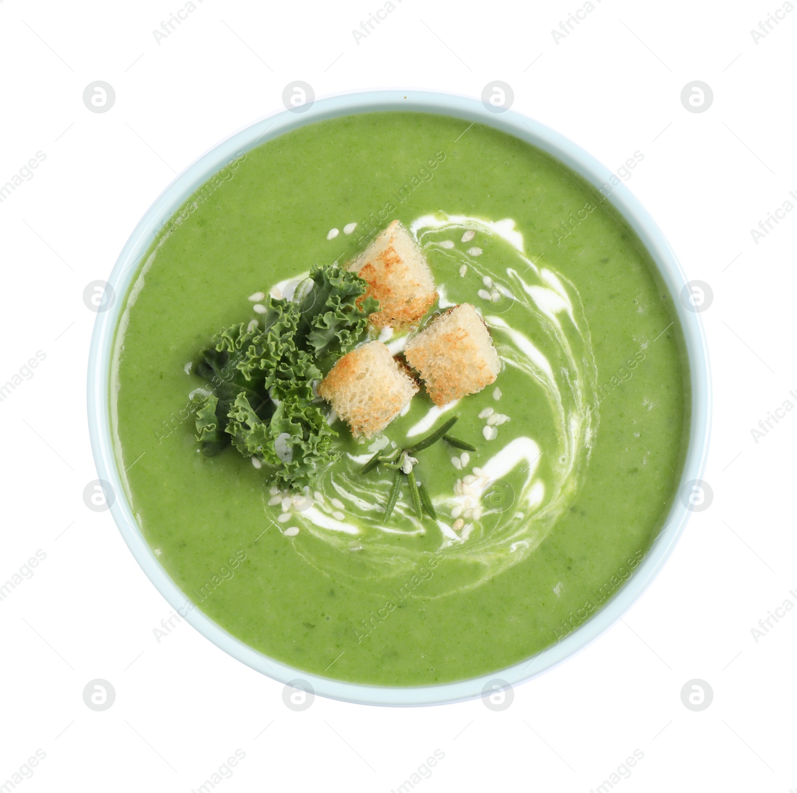 Photo of Tasty kale soup with croutons isolated on white, top view