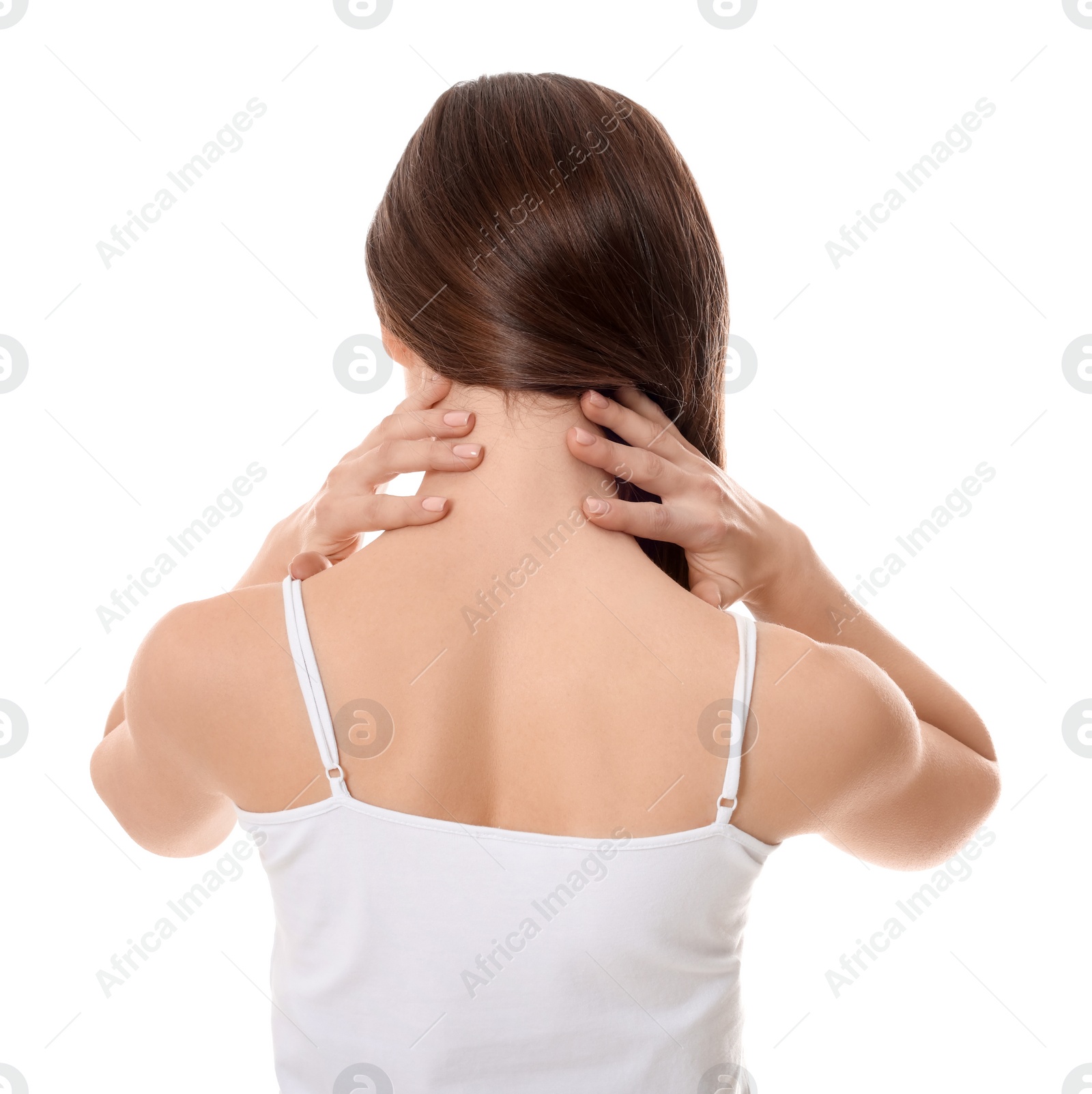 Photo of Woman suffering from neck pain on white background, back view. Arthritis symptoms