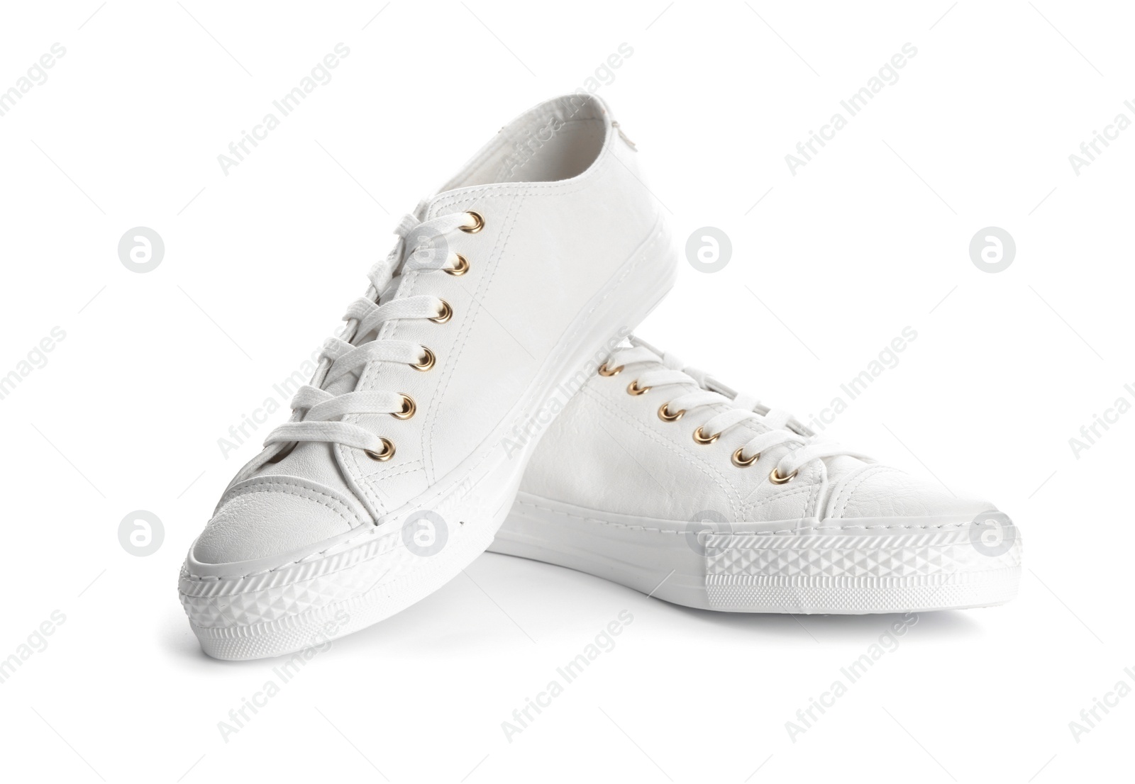 Photo of Pair of stylish sneakers on white background