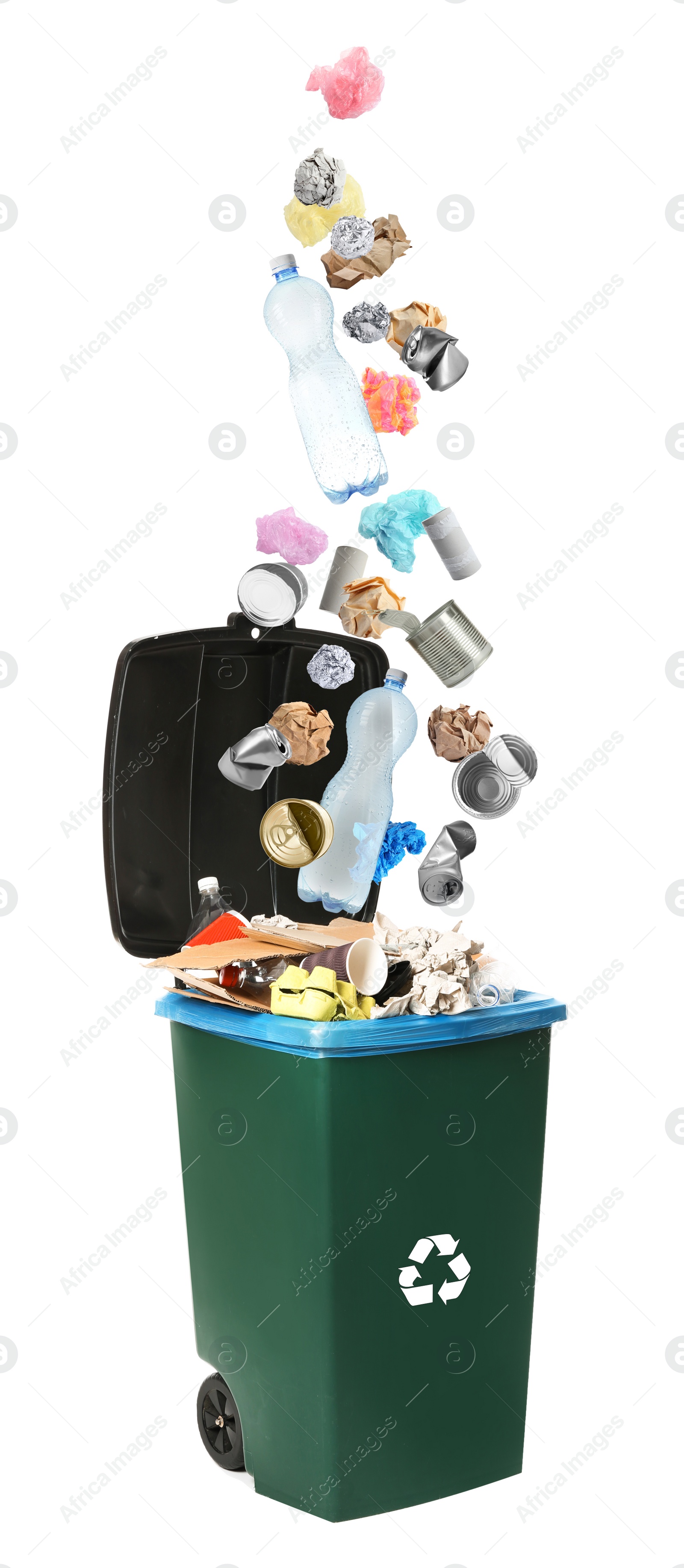 Image of Different garbage falling into trash bin. Waste management and recycling