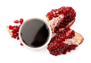 Photo of Bowl of pomegranate sauce and fresh ripe fruit on white background