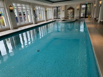 Photo of Amsterdam, Netherlands - September 23, 2023: Big swimming pool with clean water in Amstel Hotel