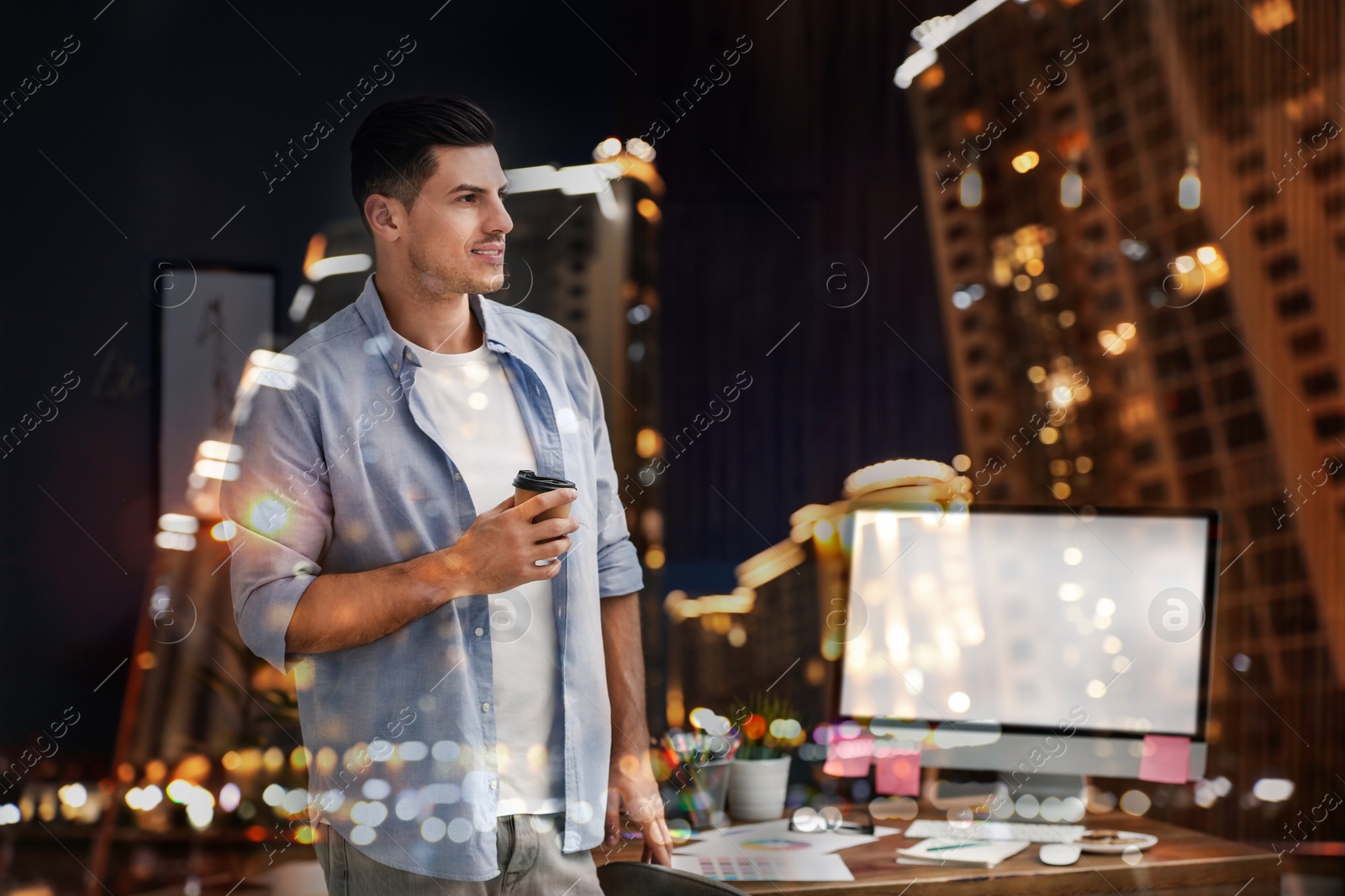 Image of Double exposure of male designer and night cityscape 