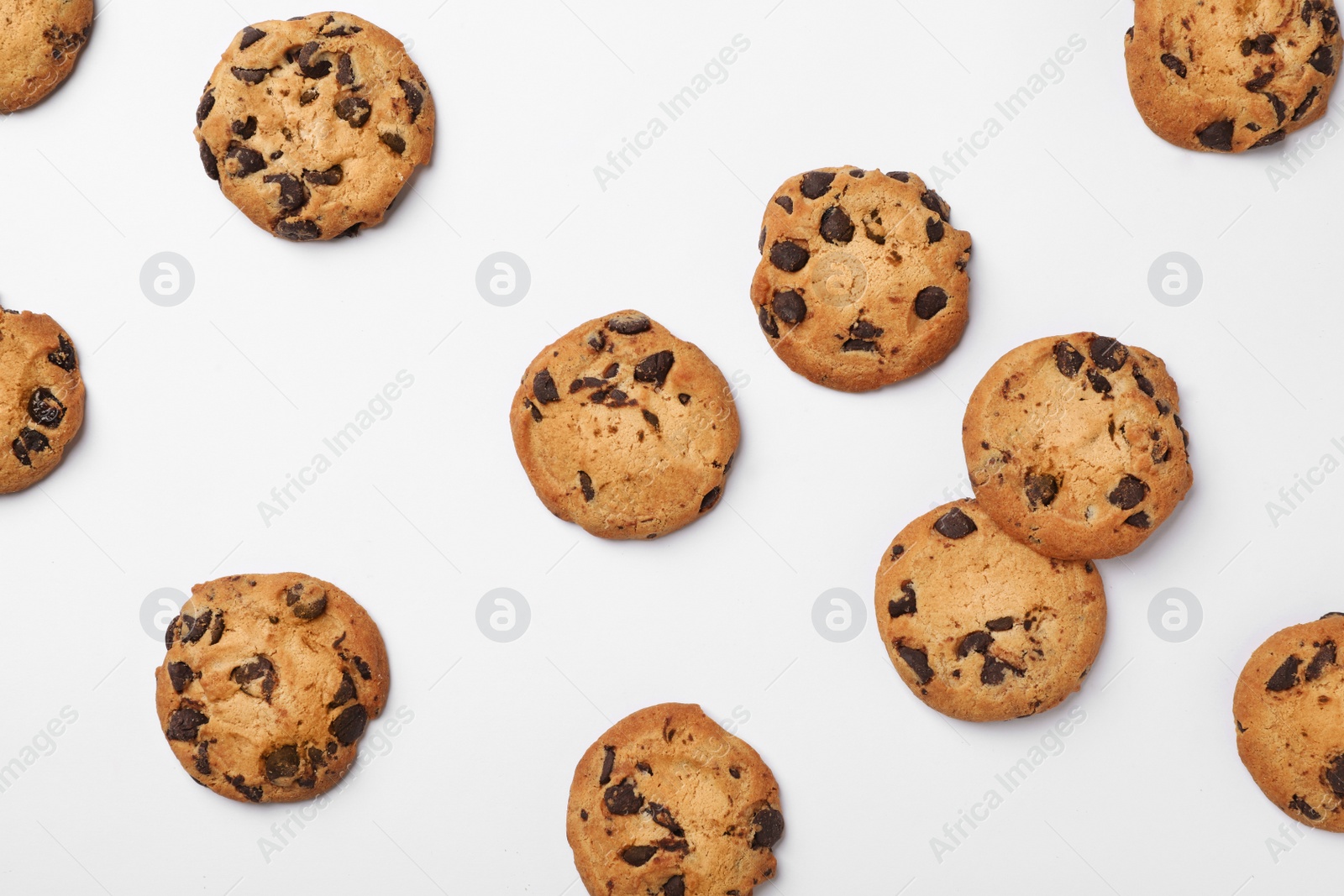 Photo of Flat lay composition with chocolate cookies on white background