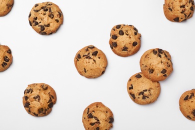 Flat lay composition with chocolate cookies on white background