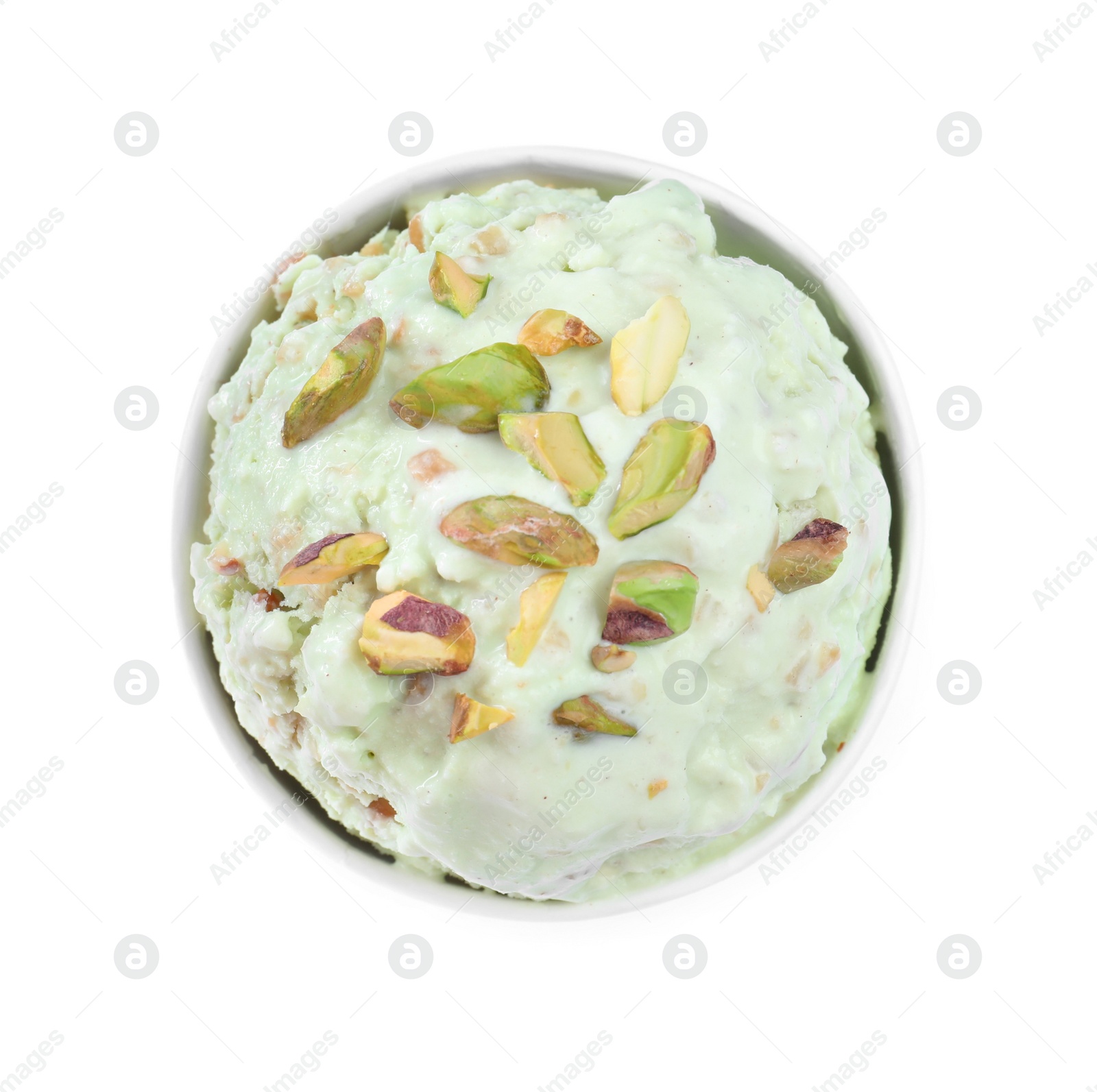 Photo of Delicious pistachio ice cream in paper cup isolated on white, top view