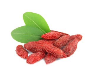 Pile of dried goji berries and leaves on white background