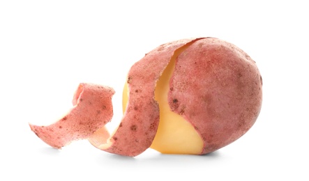 Photo of Ripe half-peeled organic potato on white background