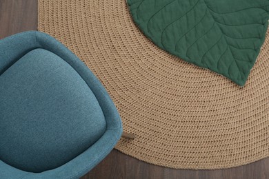 Photo of Stylish light blue chair on floor, top view. Space for text