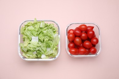 Photo of Glass containers with fresh products on light pink background, flat lay