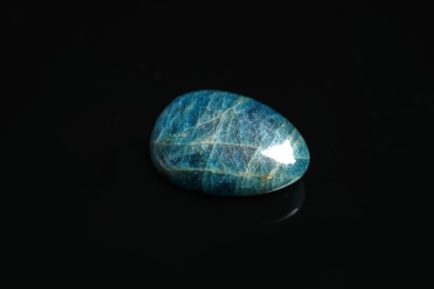 Beautiful blue apatite gemstone on black background