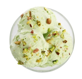 Photo of Dishware of sweet pistachio ice cream on white background, top view