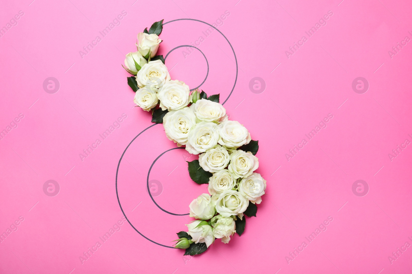 Photo of 8 March greeting card design with white roses on pink background, flat lay. International Women's day