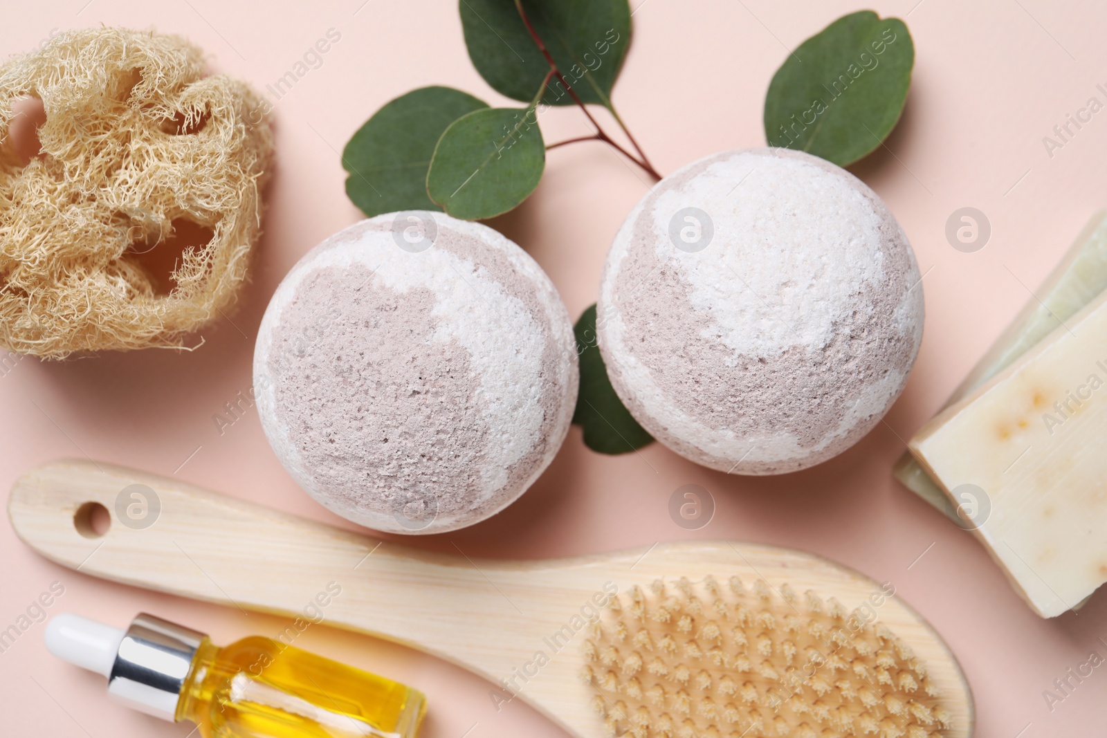 Photo of Flat lay composition with bath bombs on beige background