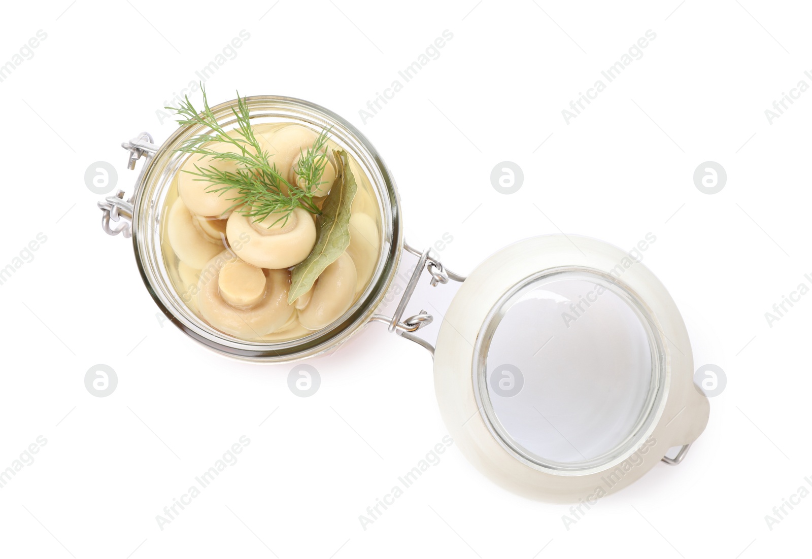 Photo of Jar with marinated mushrooms and dill isolated on white, top view