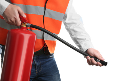 Photo of Worker using fire extinguisher on white background, closeup