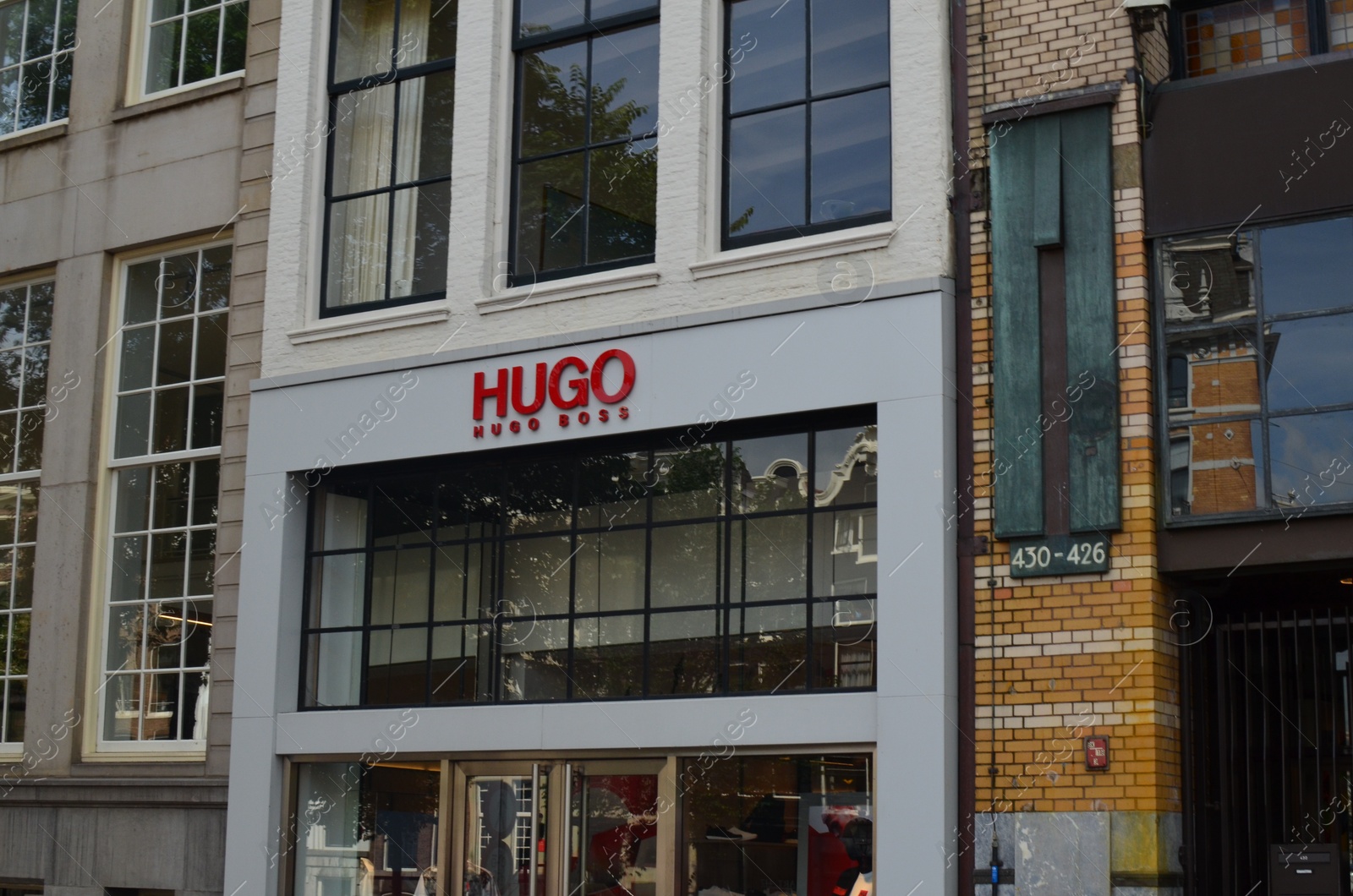 Photo of Amsterdam, Netherlands - June 25, 2022: Facade of Hugo Boss fashion store