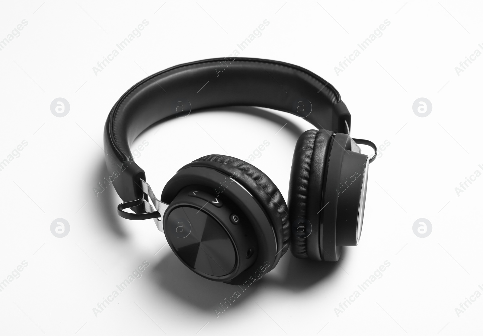 Photo of Stylish modern wireless headphones on white background