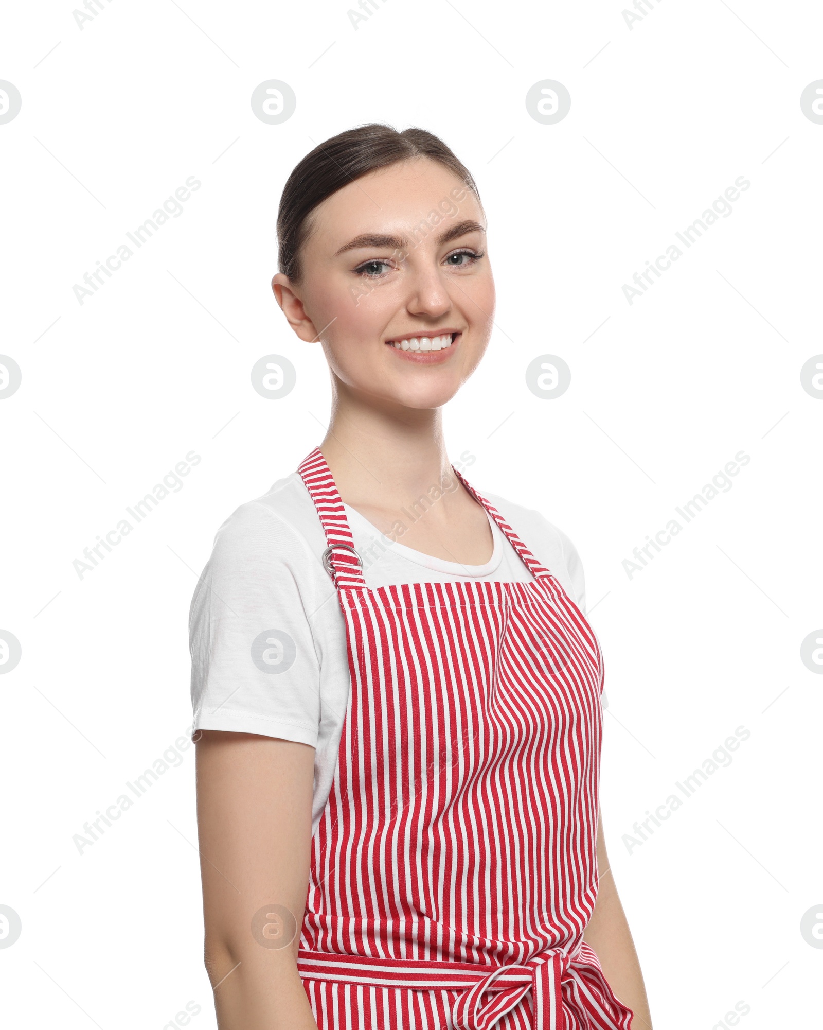 Photo of Beautiful young woman in clean striped apron on white background