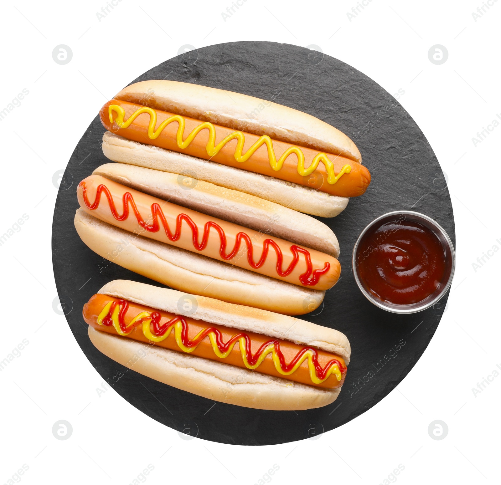 Photo of Delicious hot dogs with sauces isolated on white, top view