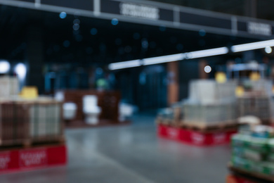 Photo of Blurred view of products on display in shopping mall. Bokeh effect