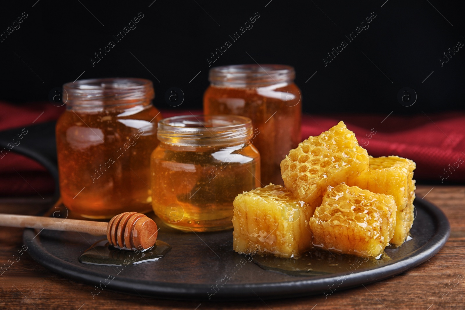 Photo of Composition with fresh delicious honey on wooden table