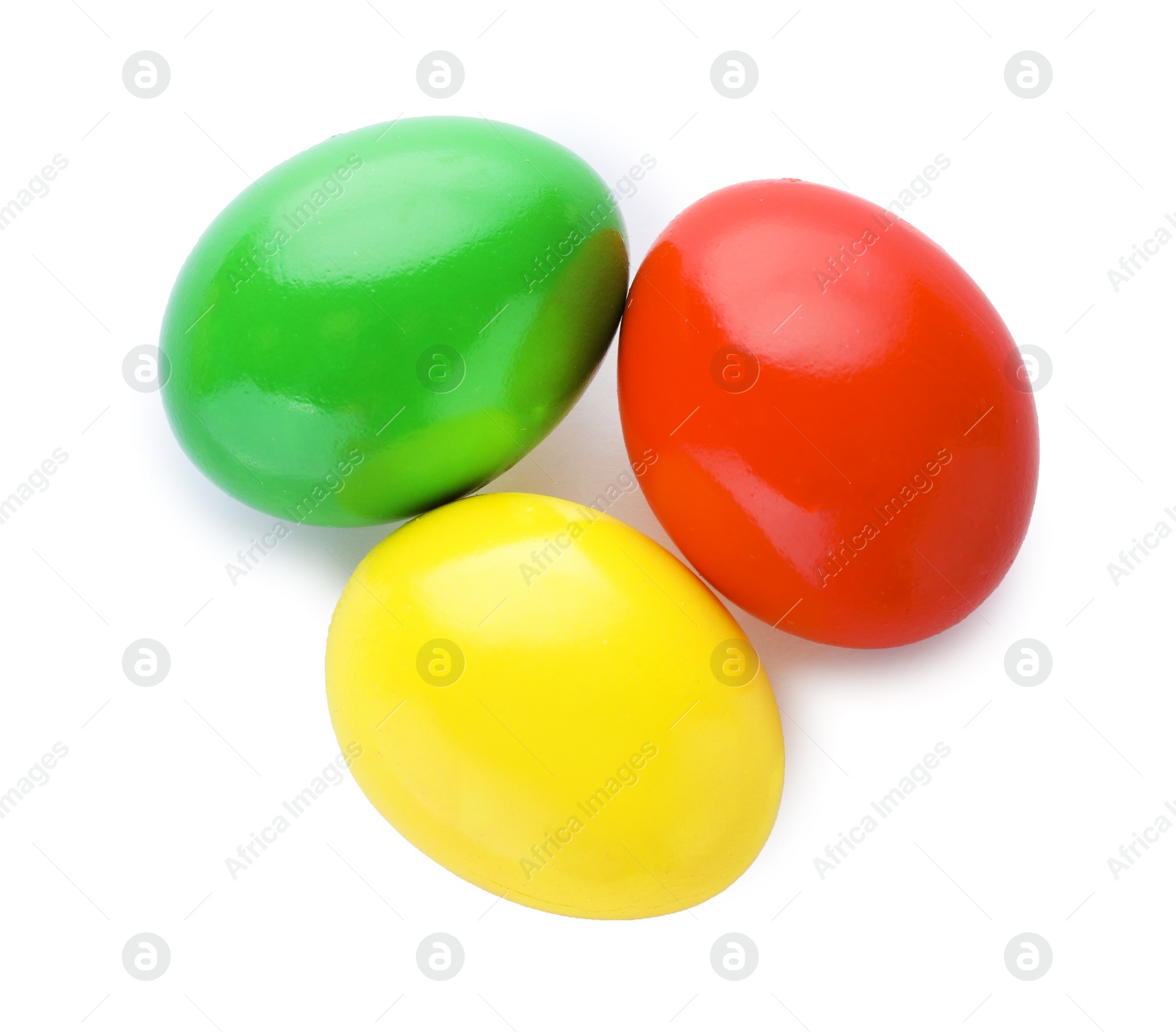 Photo of Dyed Easter eggs on white background, top view. Festive tradition