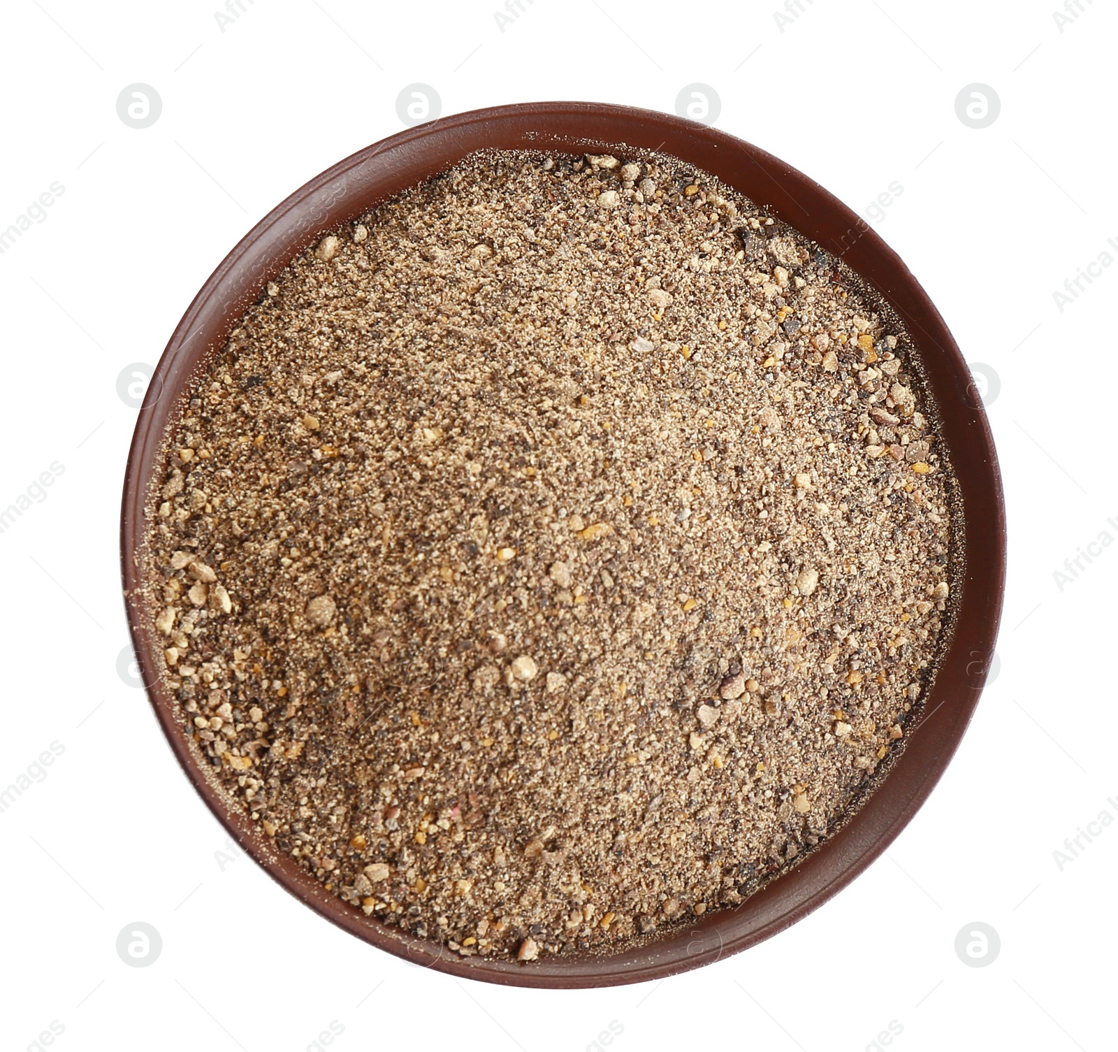 Photo of Bowl of ground black pepper isolated on white, top view