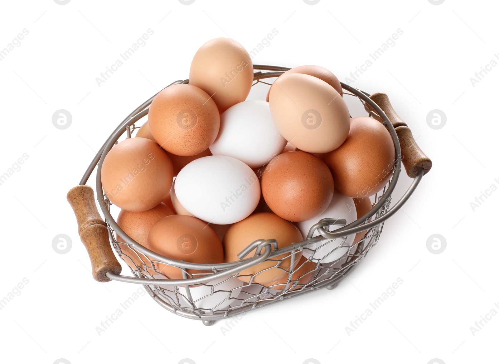 Photo of Fresh chicken eggs in metal basket isolated on white